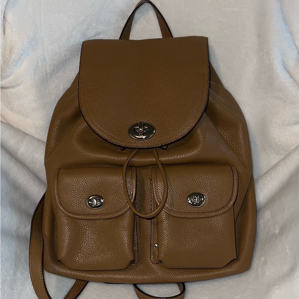 Coach Brown Leather Backpack with Structured Design and Turnlock Closure